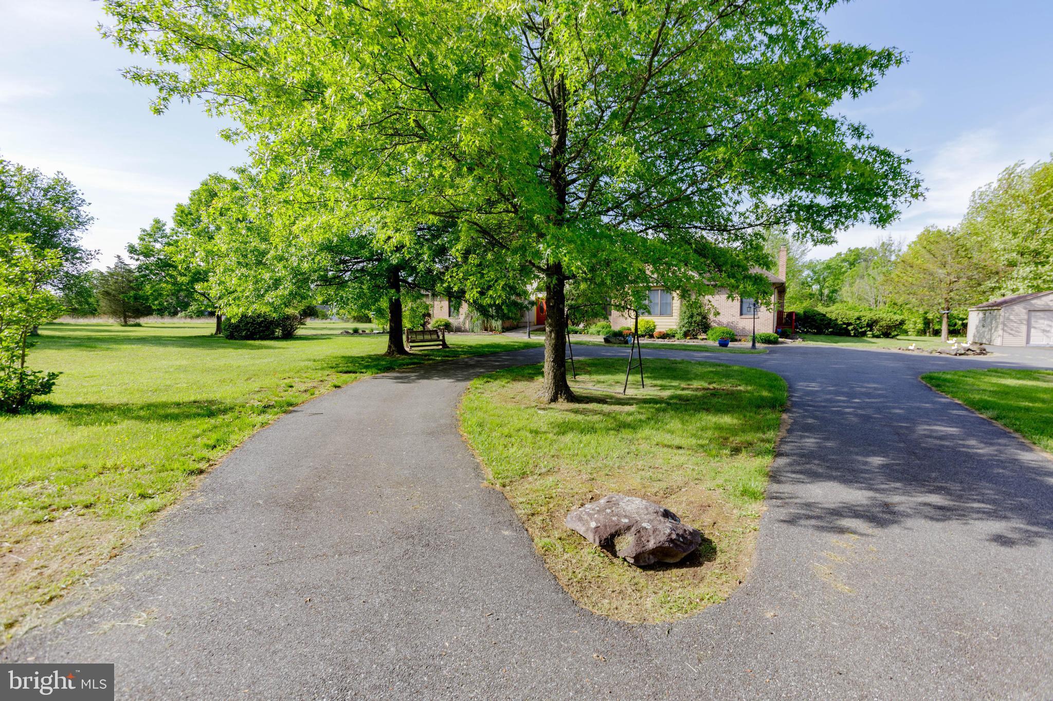 3494 Finland Road Pennsburg, PA 18073 - Photo 43 of 63 a view of a garden with a trees