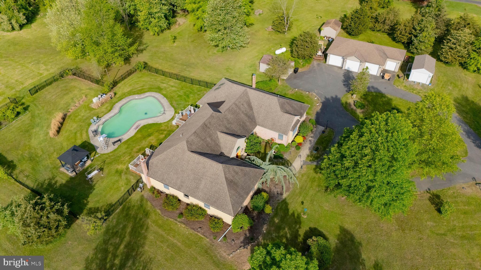 3494 Finland Road Pennsburg, PA 18073 - Photo 50 of 63 an aerial view of a house with a swimming pool
