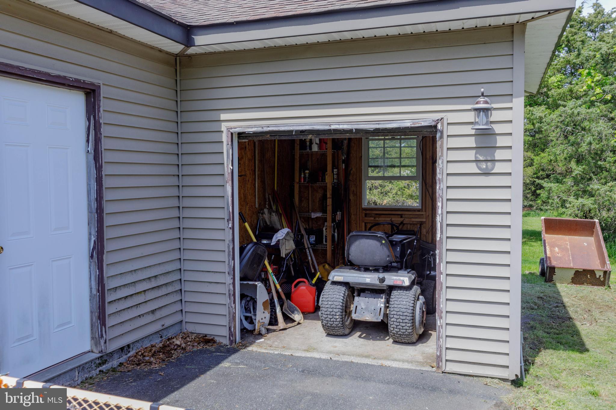3494 Finland Road Pennsburg, PA 18073 - Photo 60 of 63 a view of a porch with furniture and a potted plant