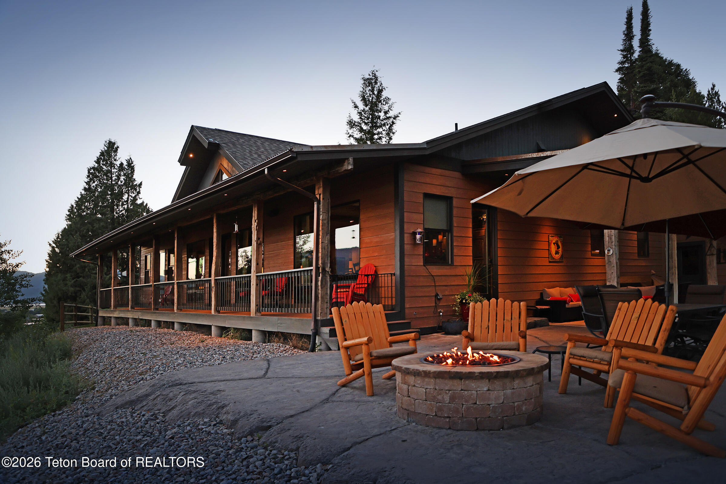 166 Aspen Ridge Trail Alpine, WY 83128 - Photo 42 of 50 41_166_Aspen_Ridge_Trail_BackPatioExteri