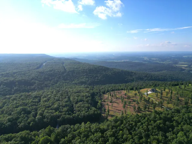 a view of a backyard of a house