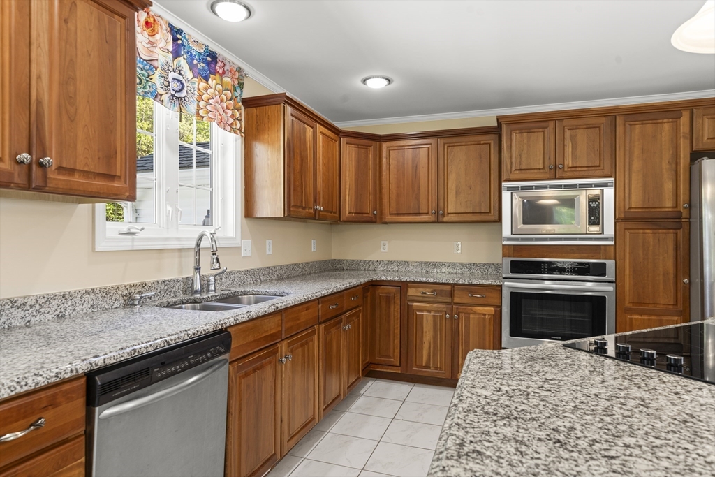 1507 East Mountain Road Westfield, MA 01085 - Photo 5 of 42 a kitchen with stainless steel appliances granite countertop a sink stove and oven