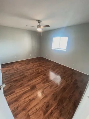 a view of an empty room with stairs