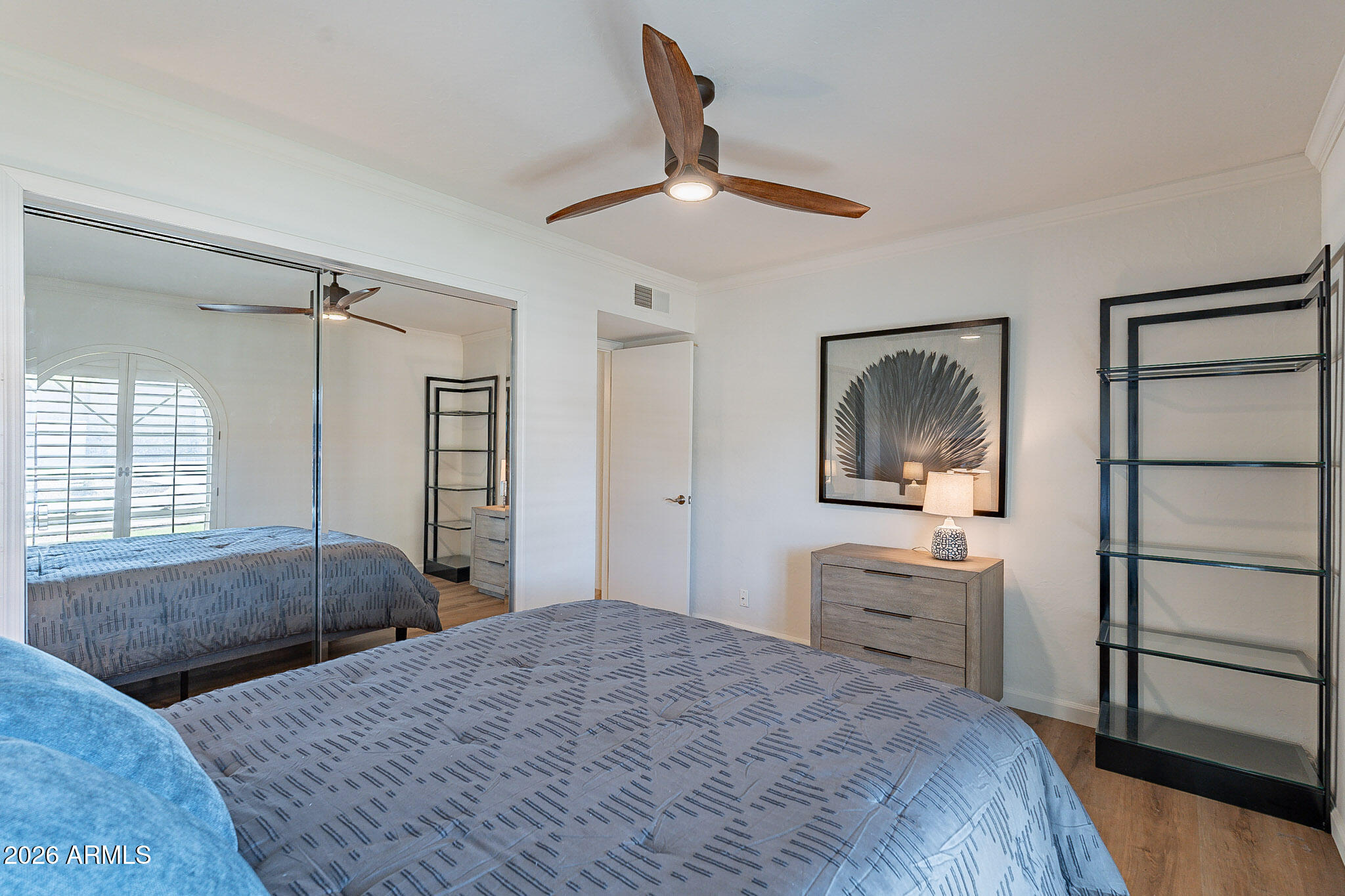 4226 East North Lane Phoenix, AZ 85028 - Photo 32 of 43 a bedroom with a bed and a dresser