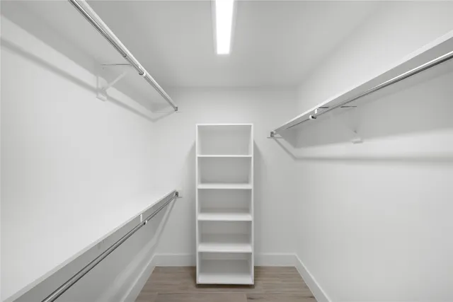 a view of an empty walk in closet