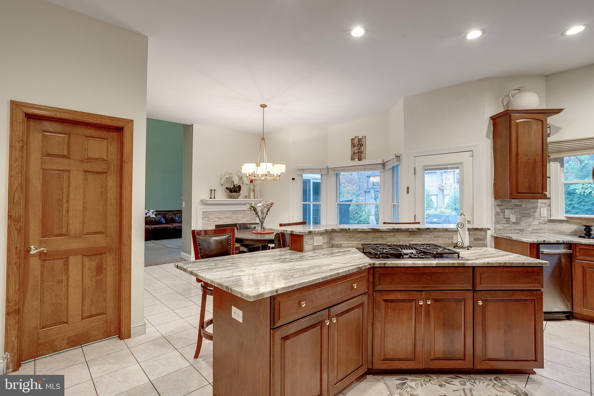 6 Oak Ridge Drive Voorhees, NJ 08043 - Photo 16 of 52 a kitchen with a stove and a refrigerator