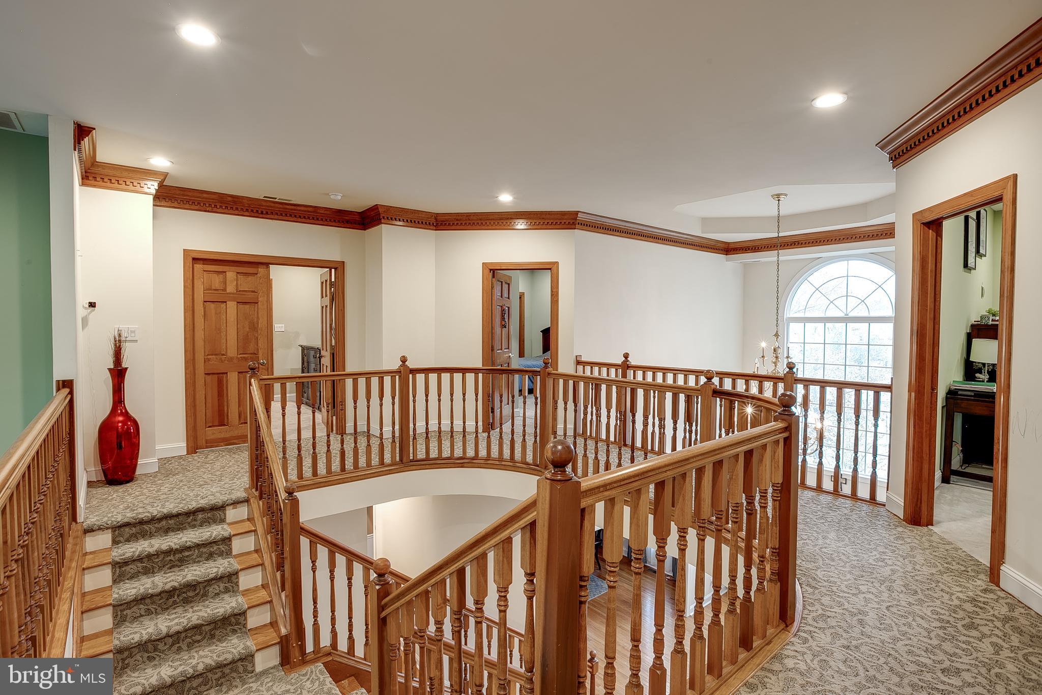 6 Oak Ridge Drive Voorhees, NJ 08043 - Photo 22 of 52 a view of staircase with railing and a large window
