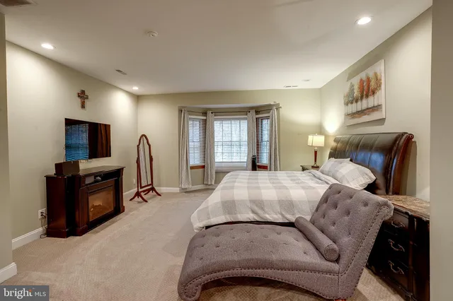 a large bathroom with a double vanity sink mirror double and bathtub