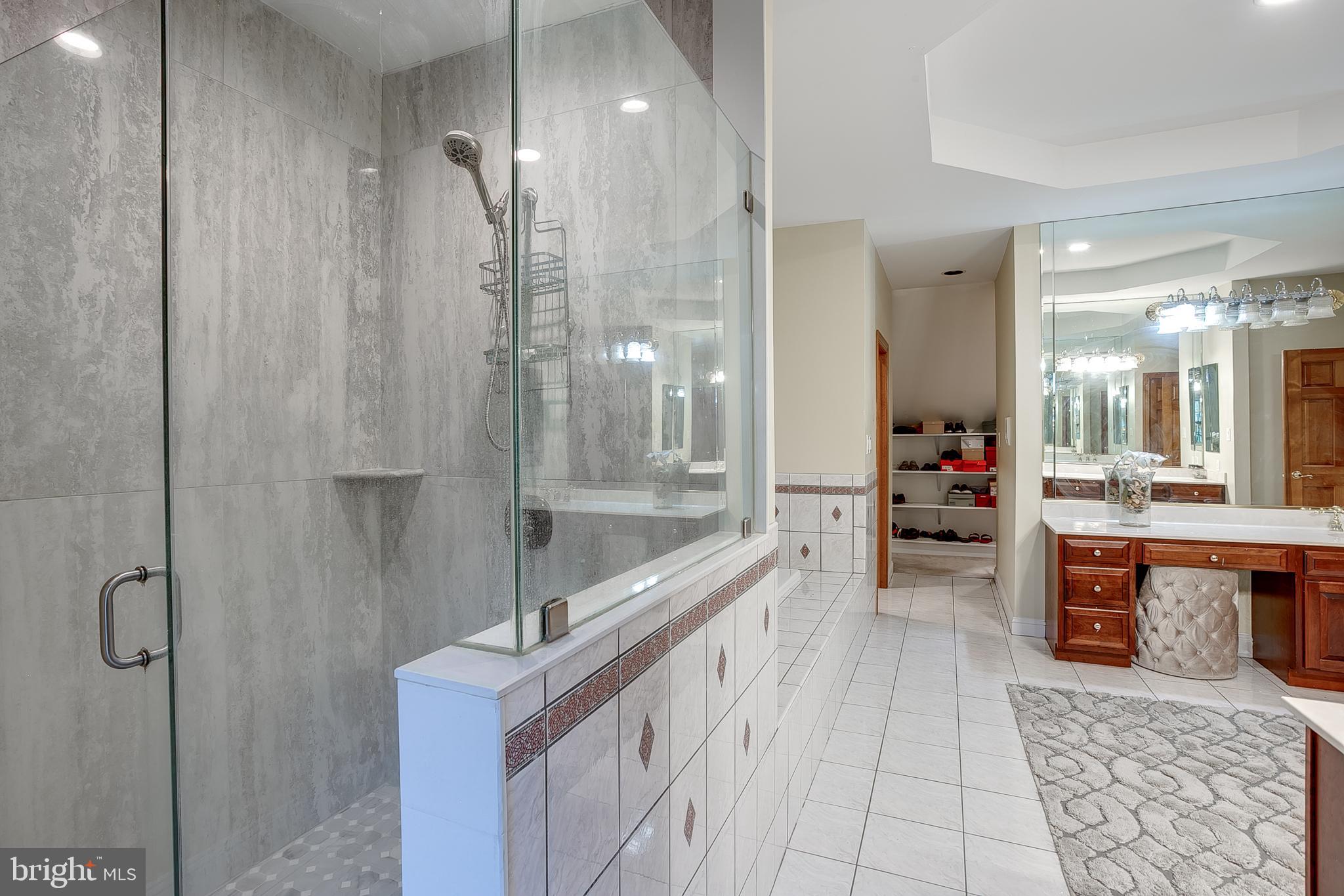 6 Oak Ridge Drive Voorhees, NJ 08043 - Photo 32 of 52 a bathroom with a tub shower and sink