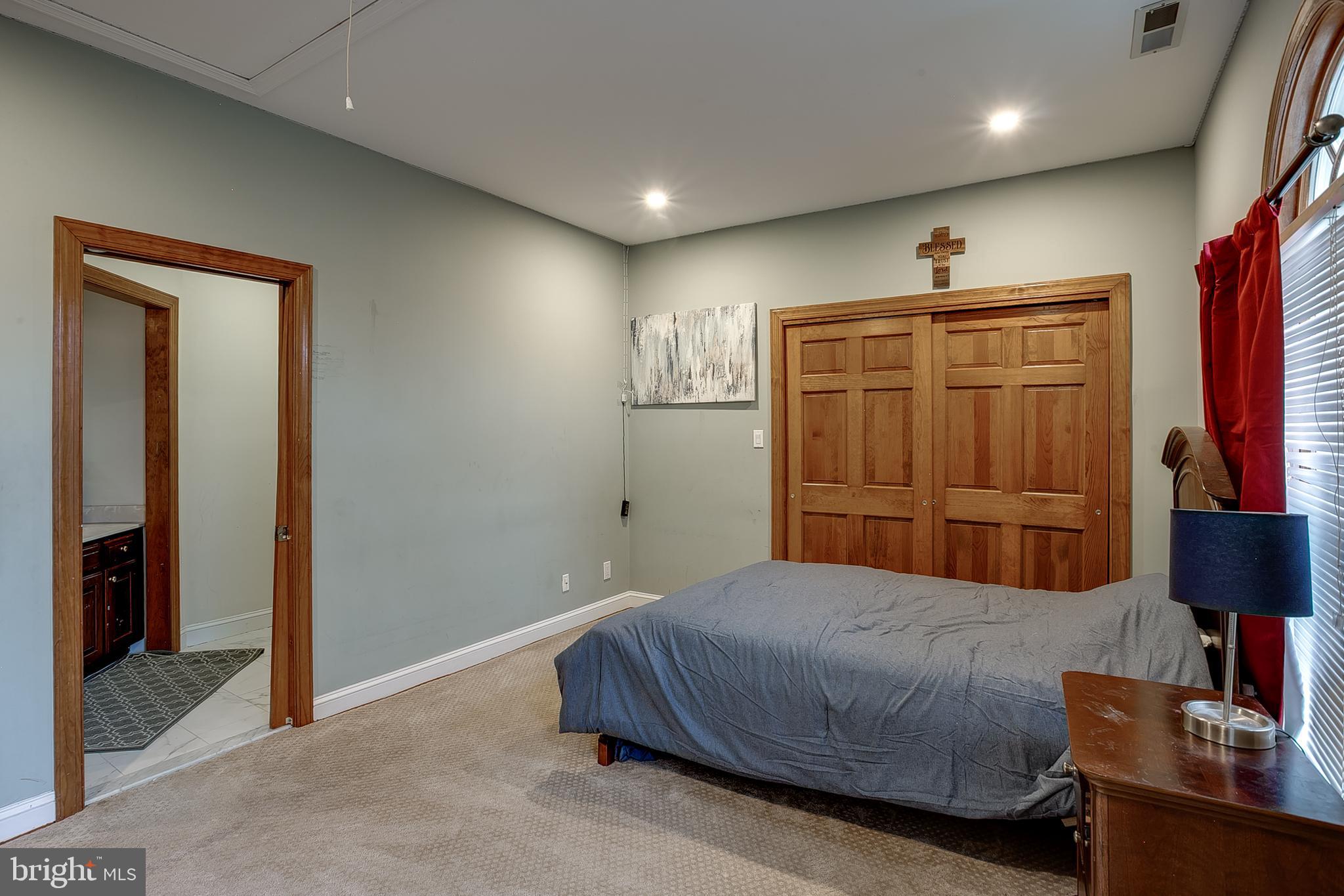 6 Oak Ridge Drive Voorhees, NJ 08043 - Photo 34 of 52 a bedroom with a bed and a television