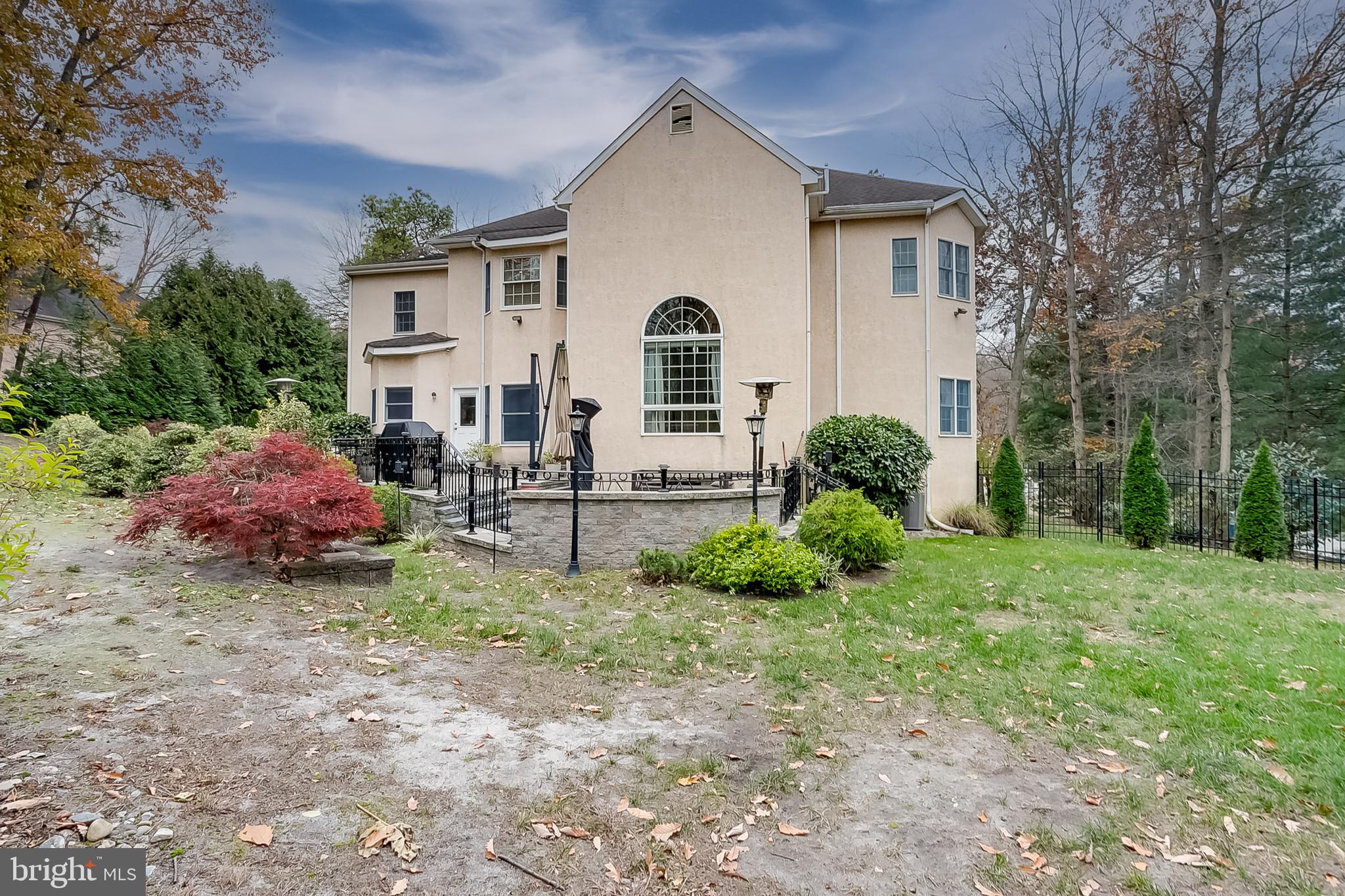 6 Oak Ridge Drive Voorhees, NJ 08043 - Photo 50 of 52 a view of a house with a yard and plants