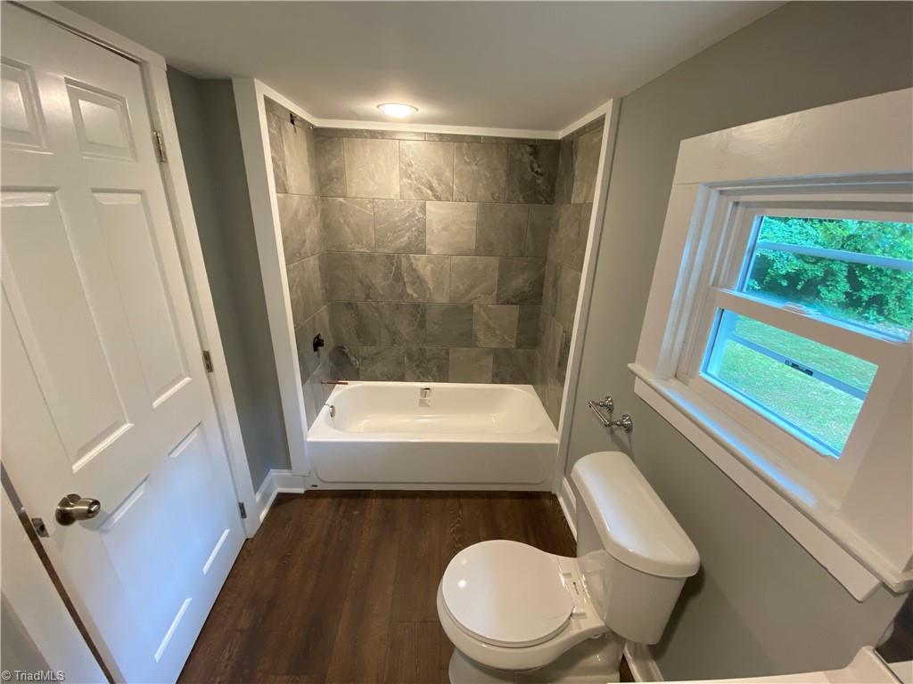 718 Oakview Road High Point, NC 27265 - Photo 12 of 19 Renovated full bath - full tile surround around the tub