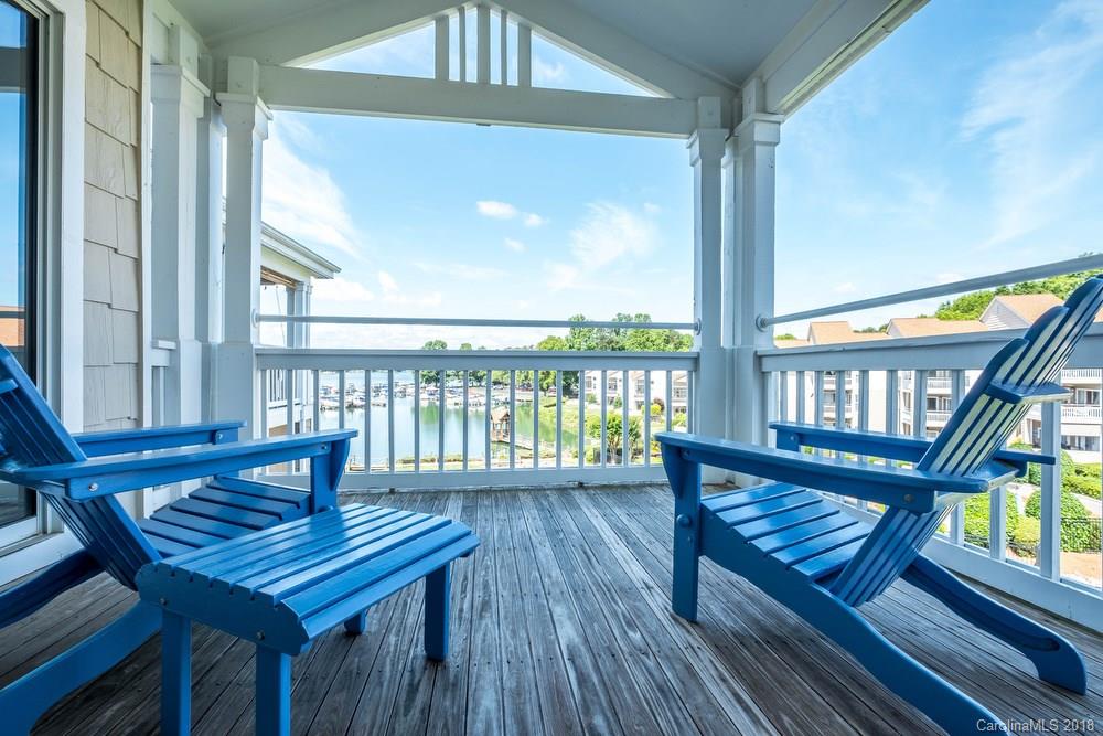 1115 Torrence Circle, Unit 63 Davidson, NC 28036 - Photo 2 of 23 a view of a balcony with furniture