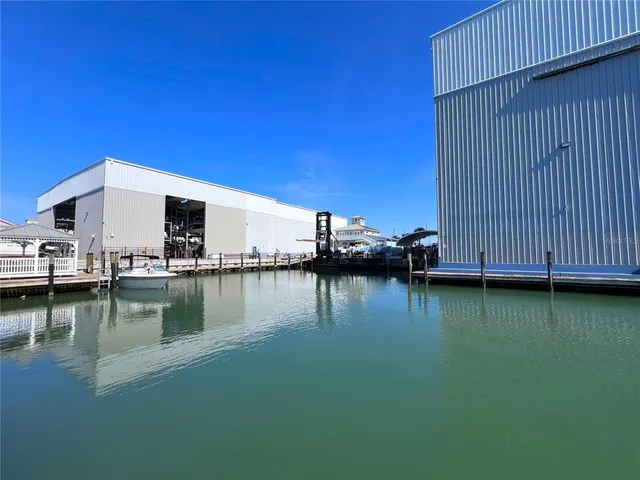 a view of a water pond with boats