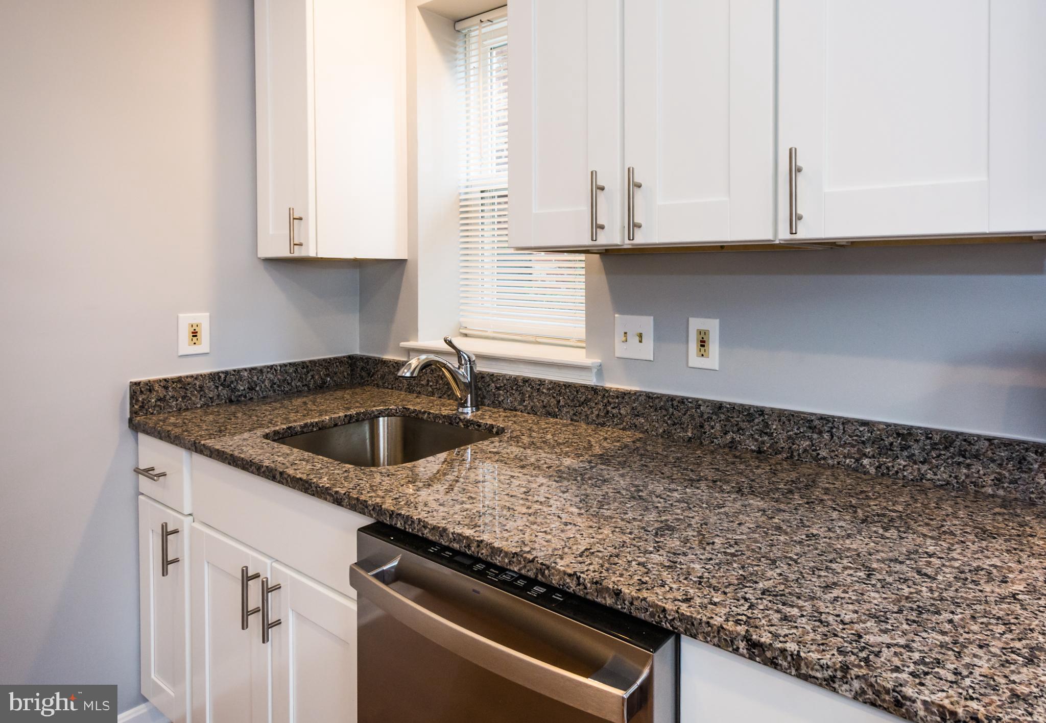 3620 Keswick Road Baltimore, MD 21211 - Photo 13 of 39 Granite Counter in Kitchen Unit 1
