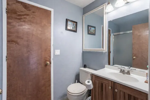 a view of a house with backyard porch and wooden floor