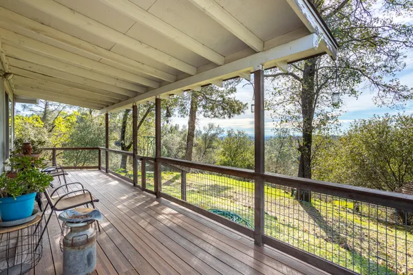 a view of a balcony with mountain