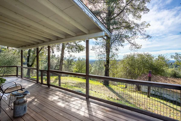 a view of a two chair in the balcony