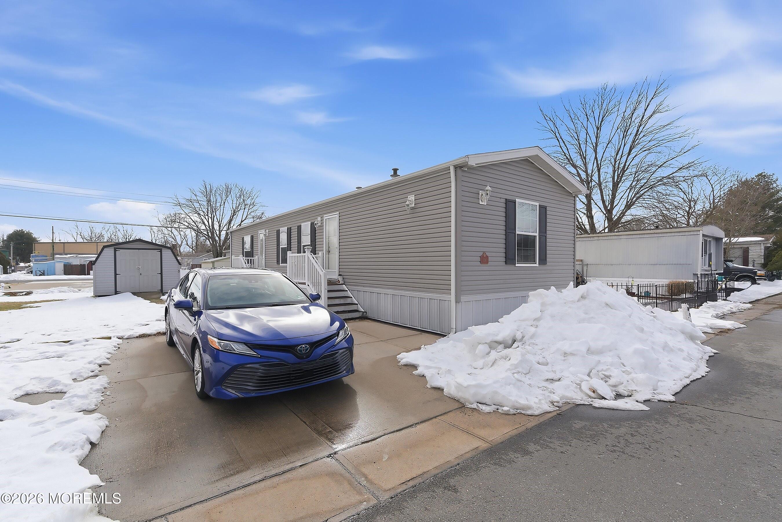 511 Sykesville Road, Unit 116 Wrightstown, NJ 08562 - Photo 7 of 14 a outdoor space view with a sitting space