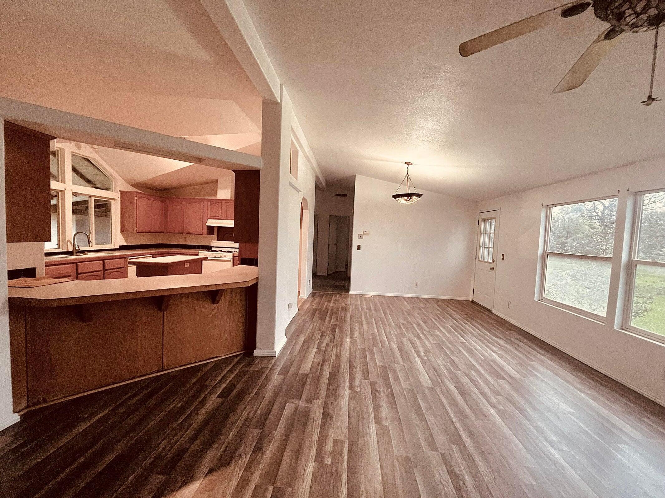 5321 Pine Street Anderson, CA 96007 - Photo 27 of 49 a view of kitchen with wooden floor and electronic appliances