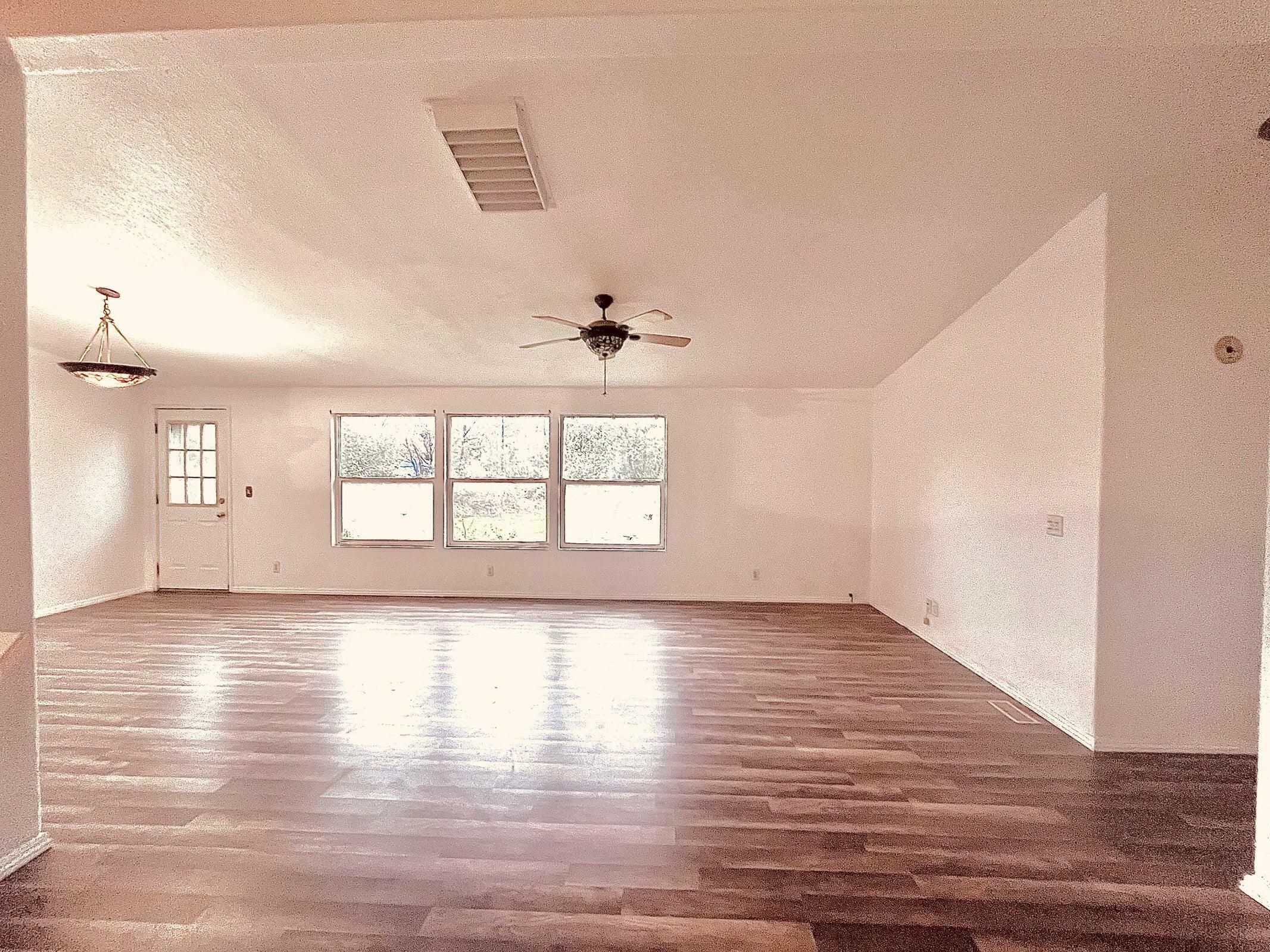 5321 Pine Street Anderson, CA 96007 - Photo 34 of 49 wooden floor in an empty room with a window