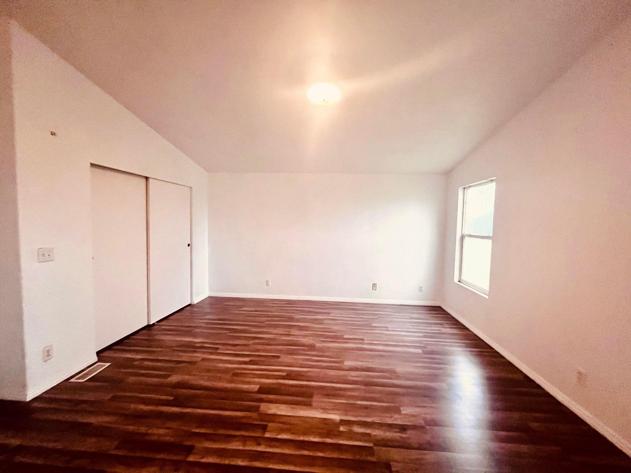 5321 Pine Street Anderson, CA 96007 - Photo 36 of 49 a view of empty room with wooden floor and fan