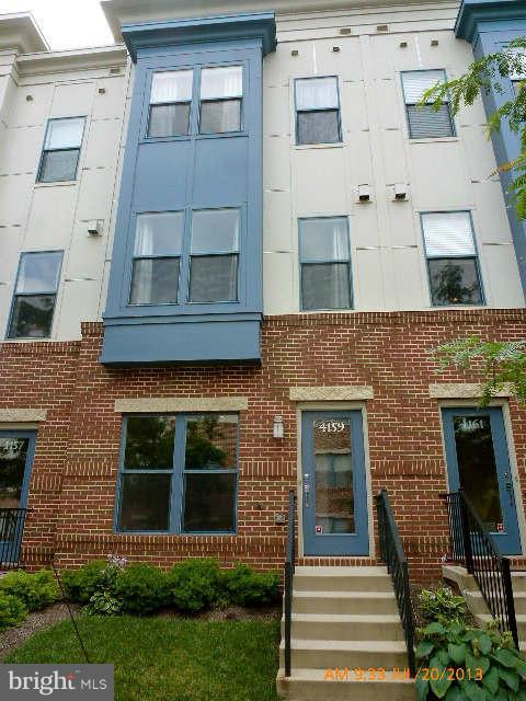 4159 Rush Street Fairfax, VA 22033 - Photo 1 of 30 a front view of a house with a garden