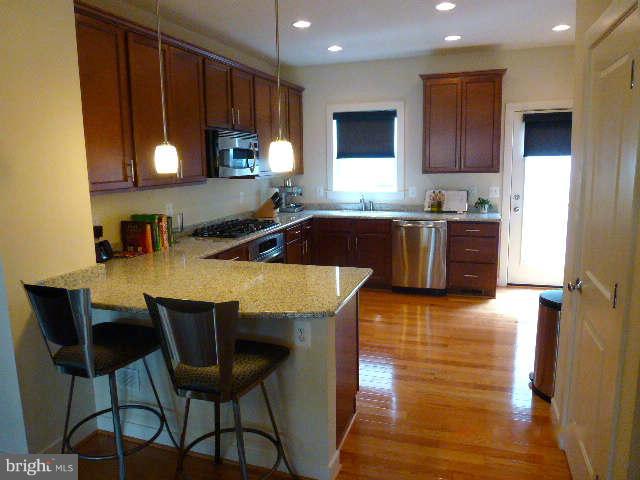 4159 Rush Street Fairfax, VA 22033 - Photo 2 of 30 a kitchen with a sink cabinets and window