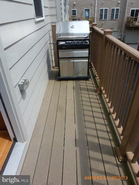4159 Rush Street Fairfax, VA 22033 - Photo 11 of 30 a close view of a kitchen counter space a stove and cabinets