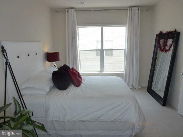 4159 Rush Street Fairfax, VA 22033 - Photo 13 of 30 a bedroom with a bed and a large window