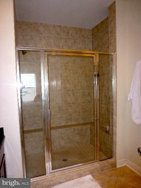4159 Rush Street Fairfax, VA 22033 - Photo 15 of 30 a bathroom with a glass shower door