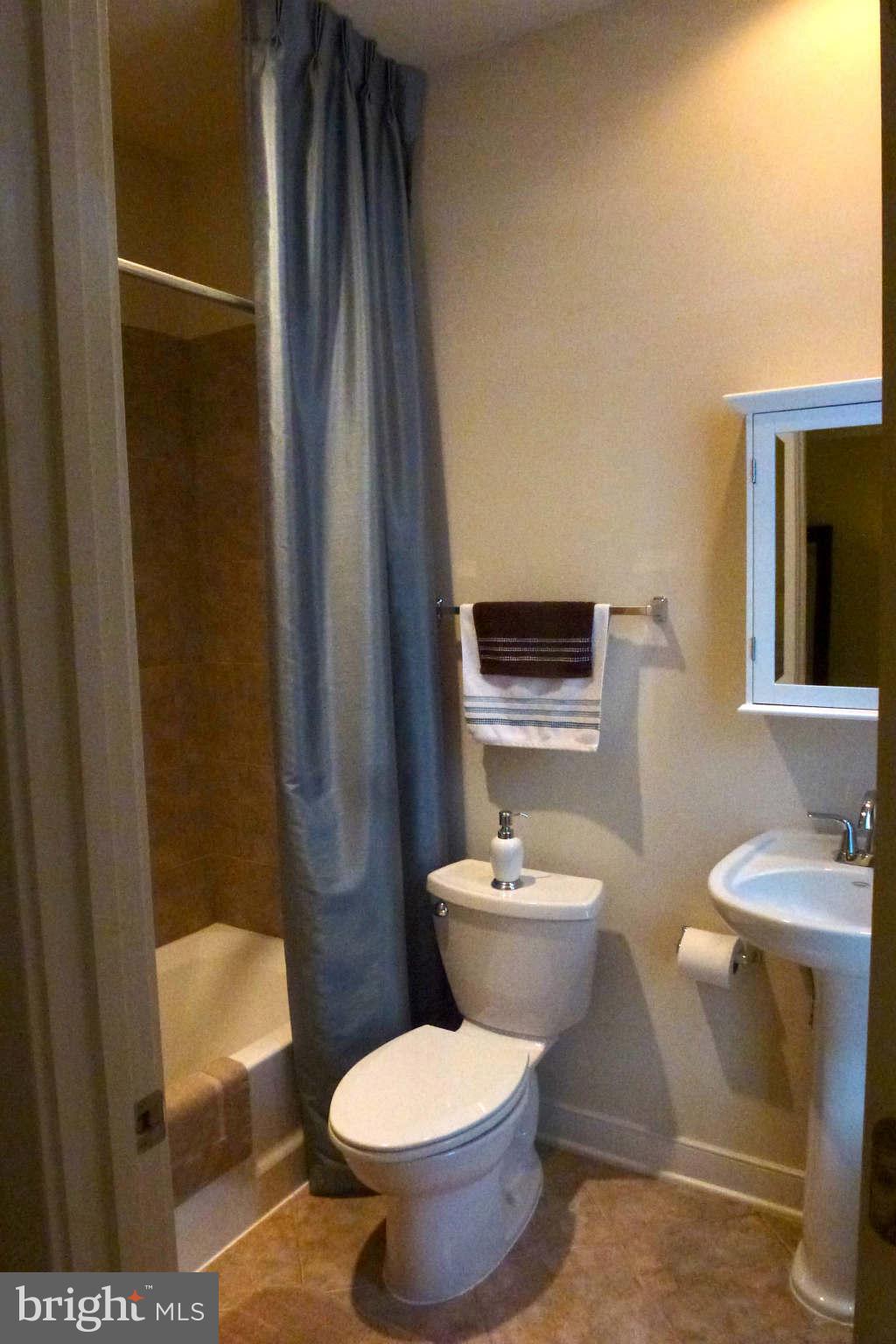 4159 Rush Street Fairfax, VA 22033 - Photo 18 of 30 a bathroom with a toilet and a sink