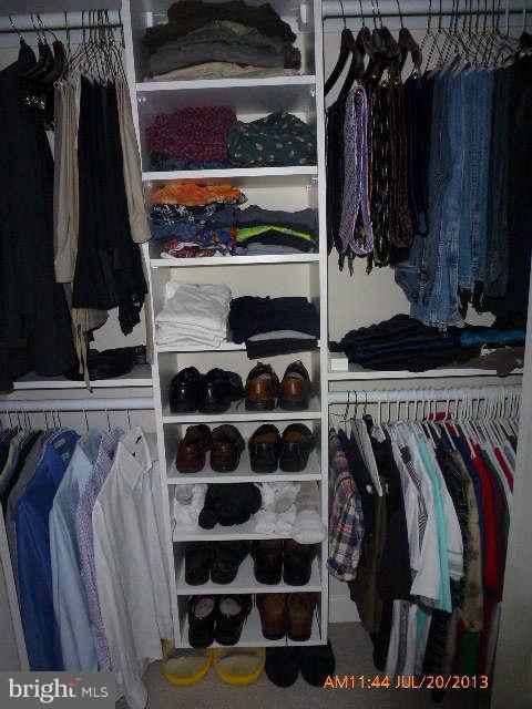 4159 Rush Street Fairfax, VA 22033 - Photo 23 of 30 a view of walk in closet with clothes and shoes