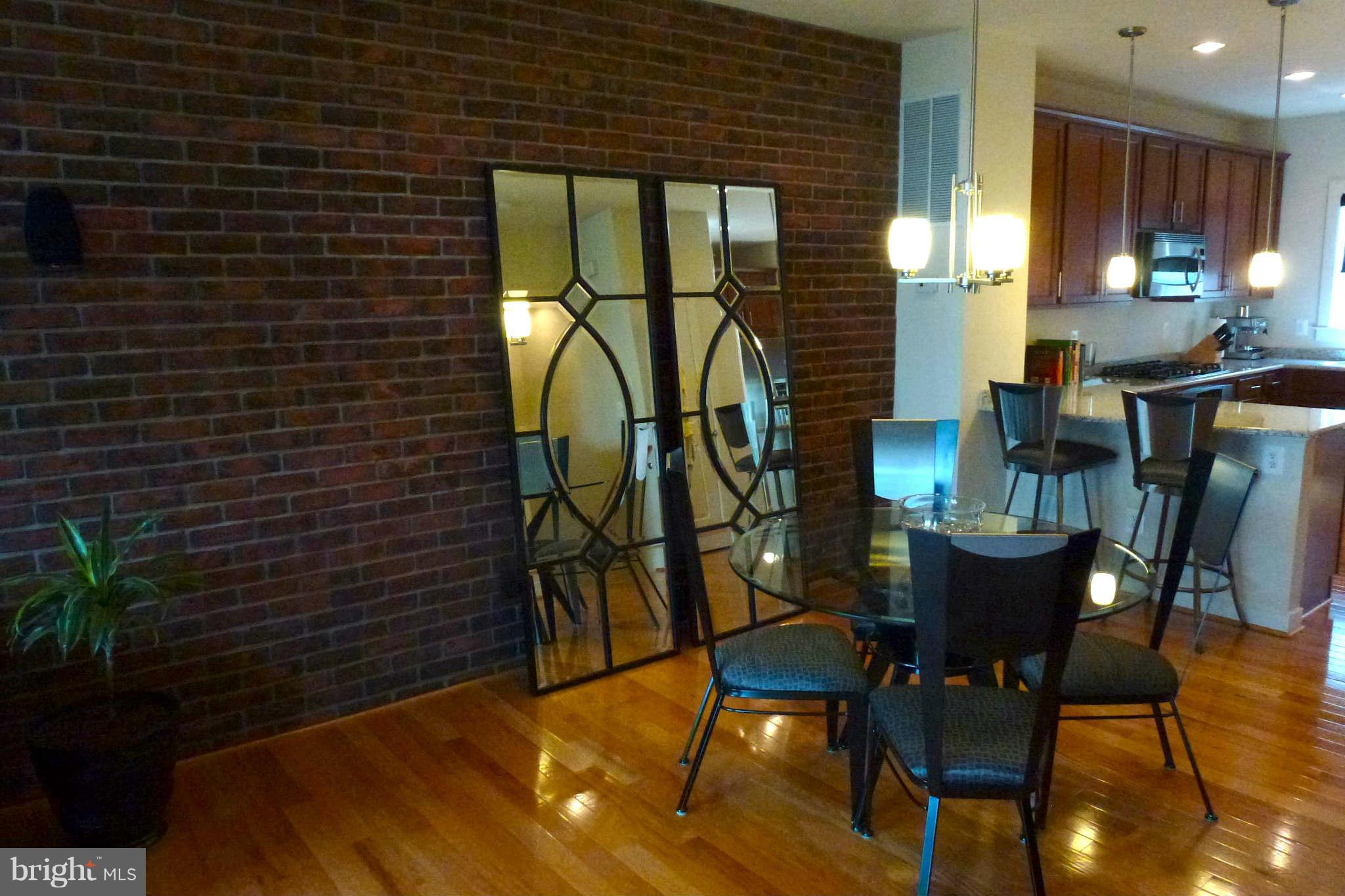 4159 Rush Street Fairfax, VA 22033 - Photo 6 of 30 a dining room with furniture and wooden floor
