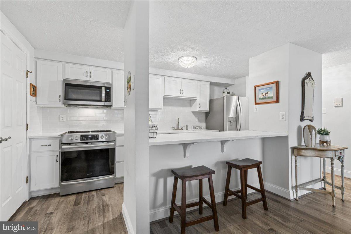 625 Deering Road, Unit 2A Pasadena, MD 21122 - Photo 3 of 32 Updated kitchen with quartz countertops