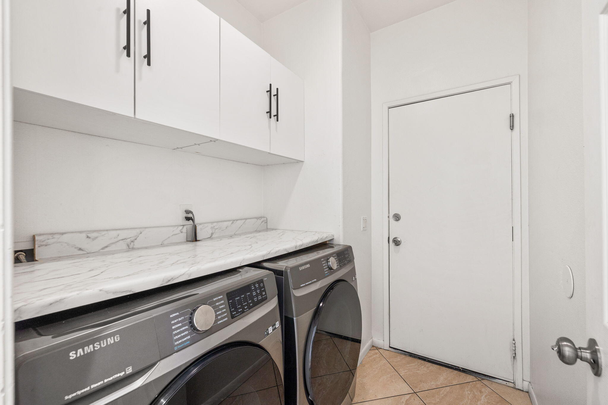 47558 Bison Circle Indio, CA 92201 - Photo 23 of 38 a utility room with dryer and washer