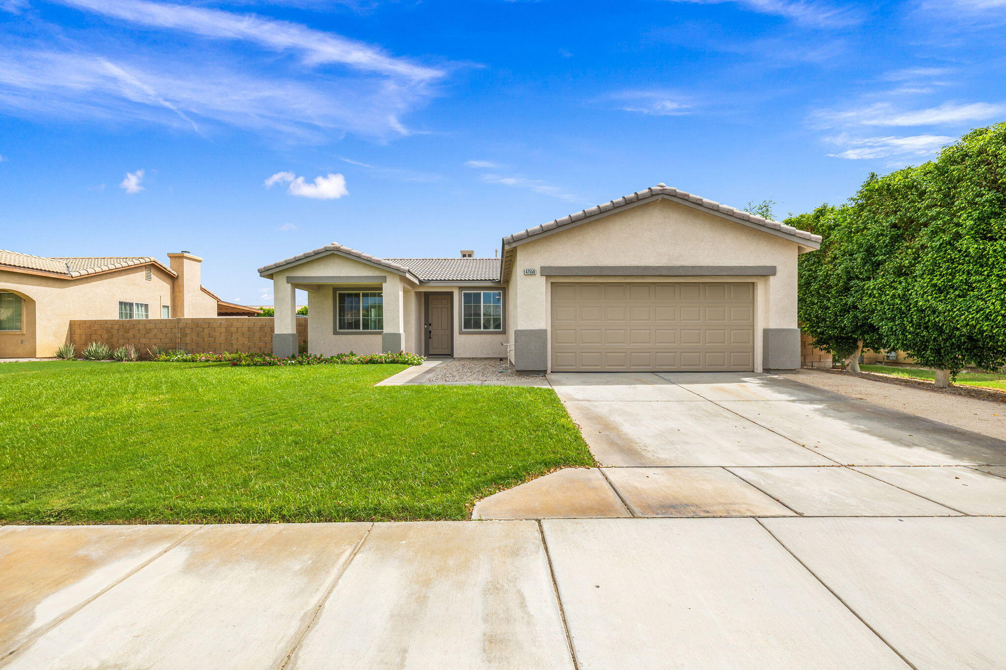 47558 Bison Circle Indio, CA 92201 - Photo 32 of 38 a front view of house with yard