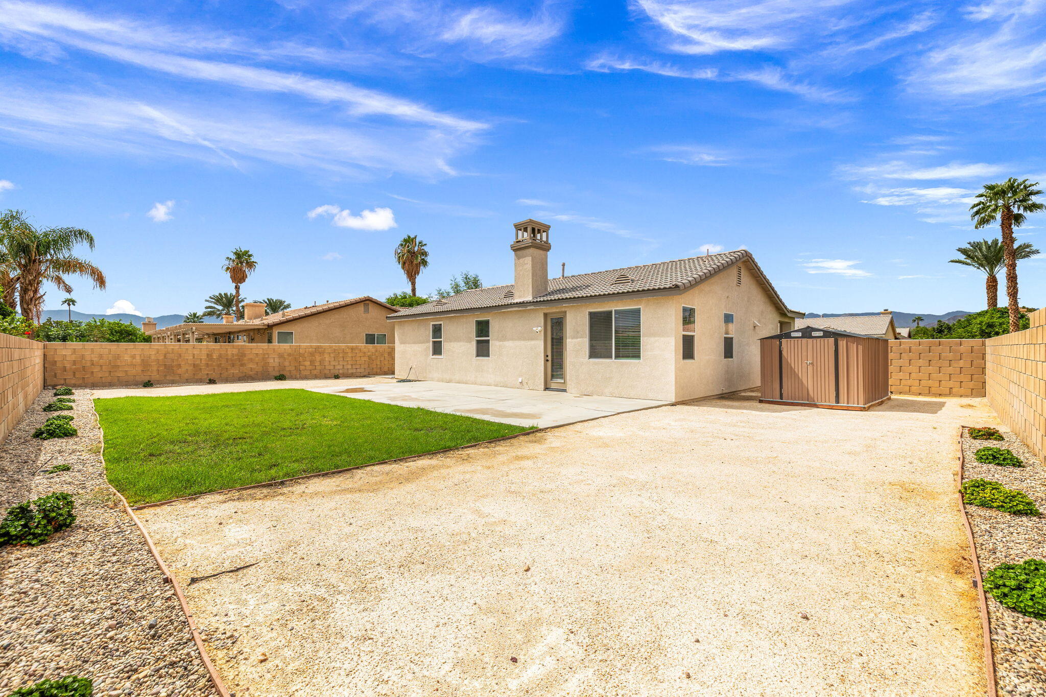47558 Bison Circle Indio, CA 92201 - Photo 33 of 38 a front view of a house with a yard