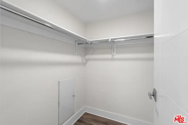 a view of a room with racks on the wall