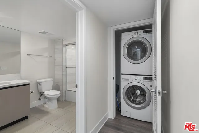 a view of a bathroom with a washer and dryer