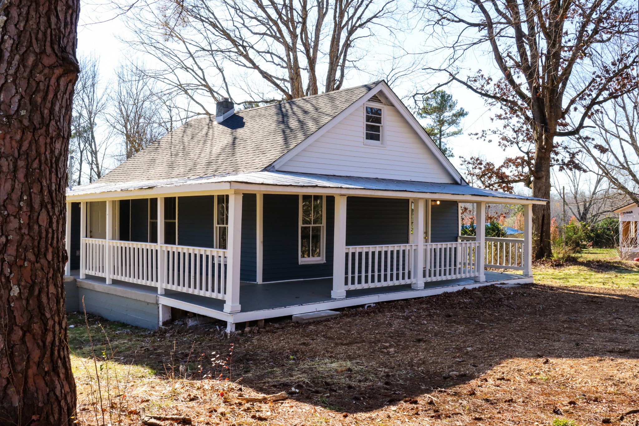 275 Telegraph Street Tennessee Ridge, TN 37178 - Photo 1 of 24 a front view of a house with garden