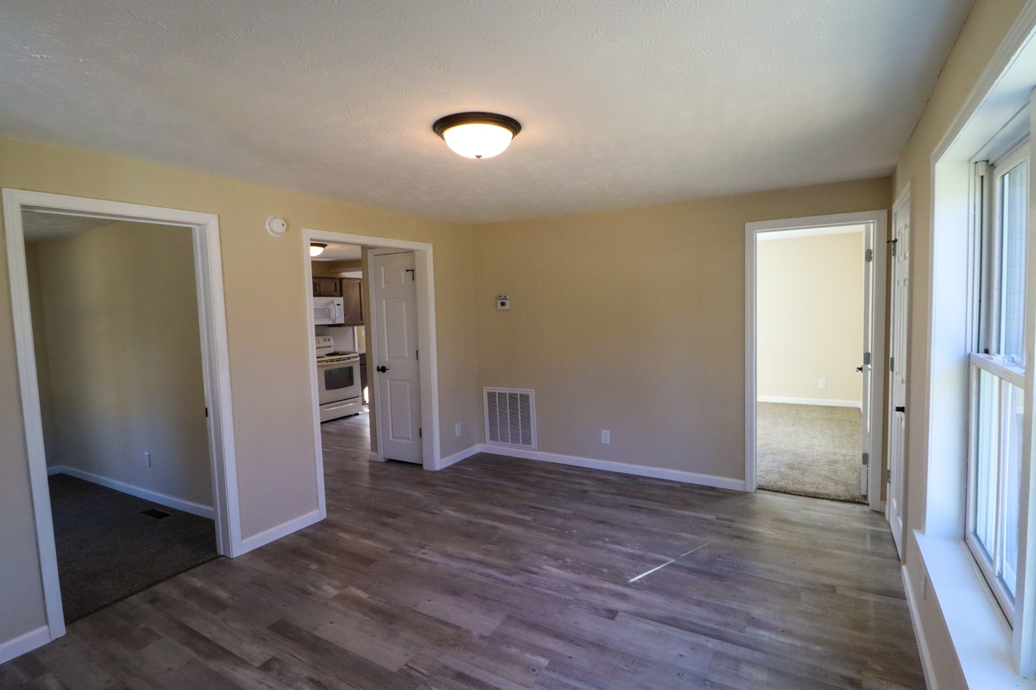 275 Telegraph Street Tennessee Ridge, TN 37178 - Photo 8 of 24 an empty room with wooden floor and closet