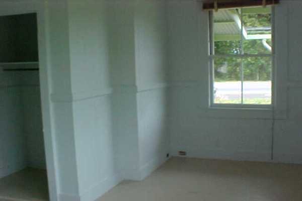 18-1190 Volcano Road Mountain View, HI 96771 - Photo 11 of 18 a view of an empty room with a window