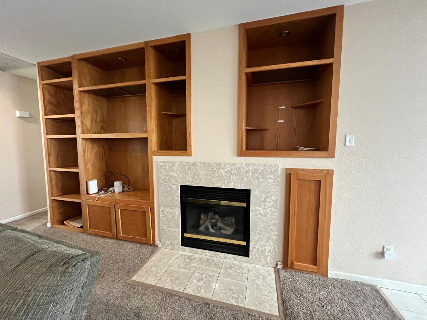 1117 Marsh Wren Court Patterson, CA 95363 - Photo 15 of 41 a living room with furniture and a fireplace