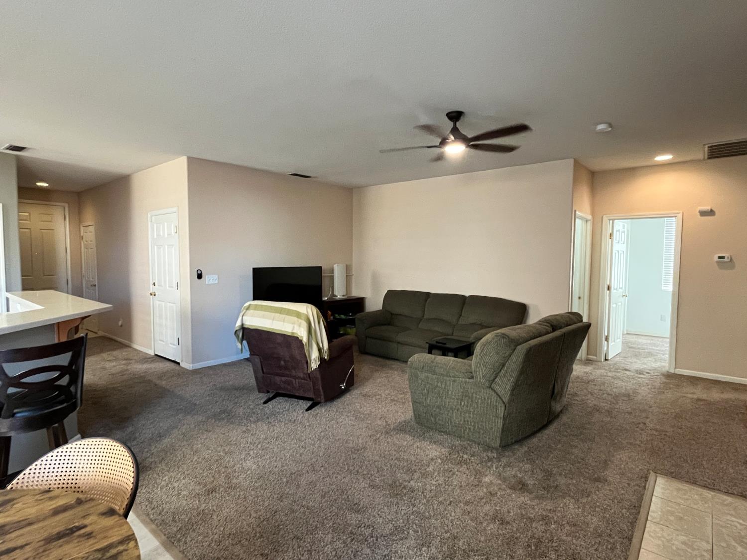 1117 Marsh Wren Court Patterson, CA 95363 - Photo 20 of 41 a living room with furniture