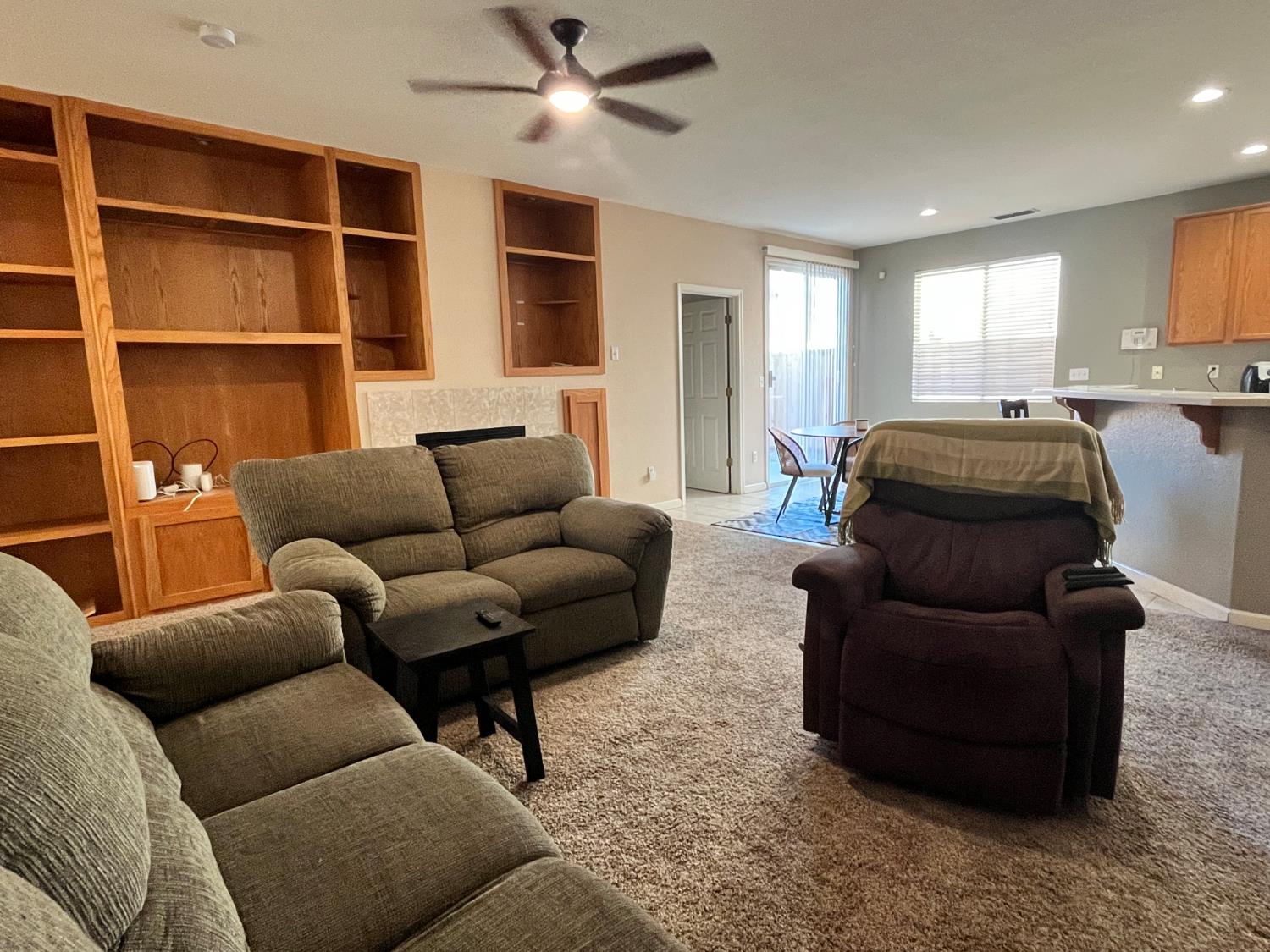 1117 Marsh Wren Court Patterson, CA 95363 - Photo 21 of 41 a living room with furniture and a window