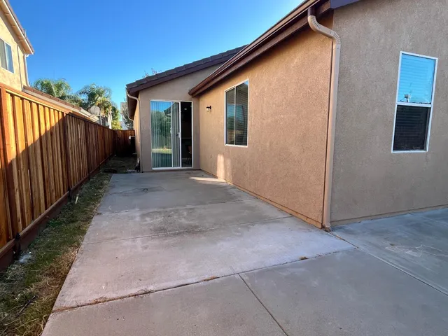 a view of a house with a patio