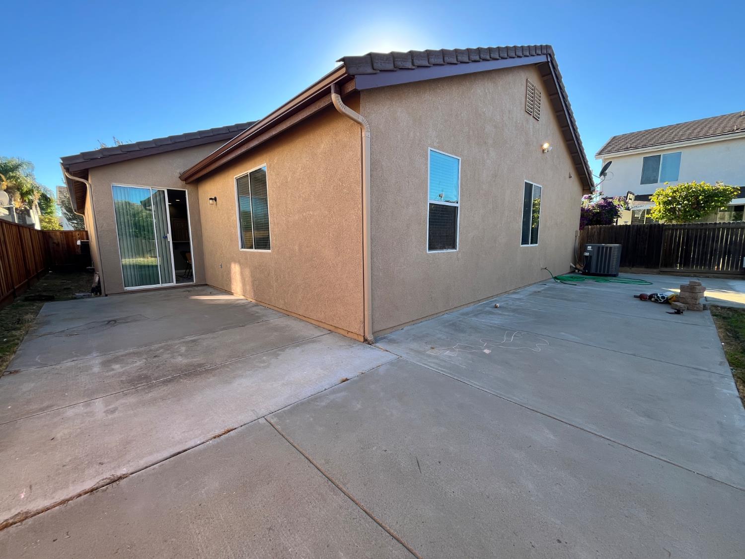 1117 Marsh Wren Court Patterson, CA 95363 - Photo 40 of 41 a view of a house with a patio