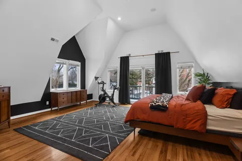 a bedroom with furniture and window