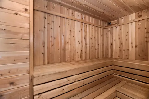a view of wooden floor with a shower